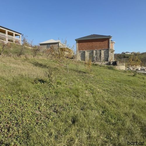 Quba Təngaltı yolunda 14 sot torpaq sahəsi satilir